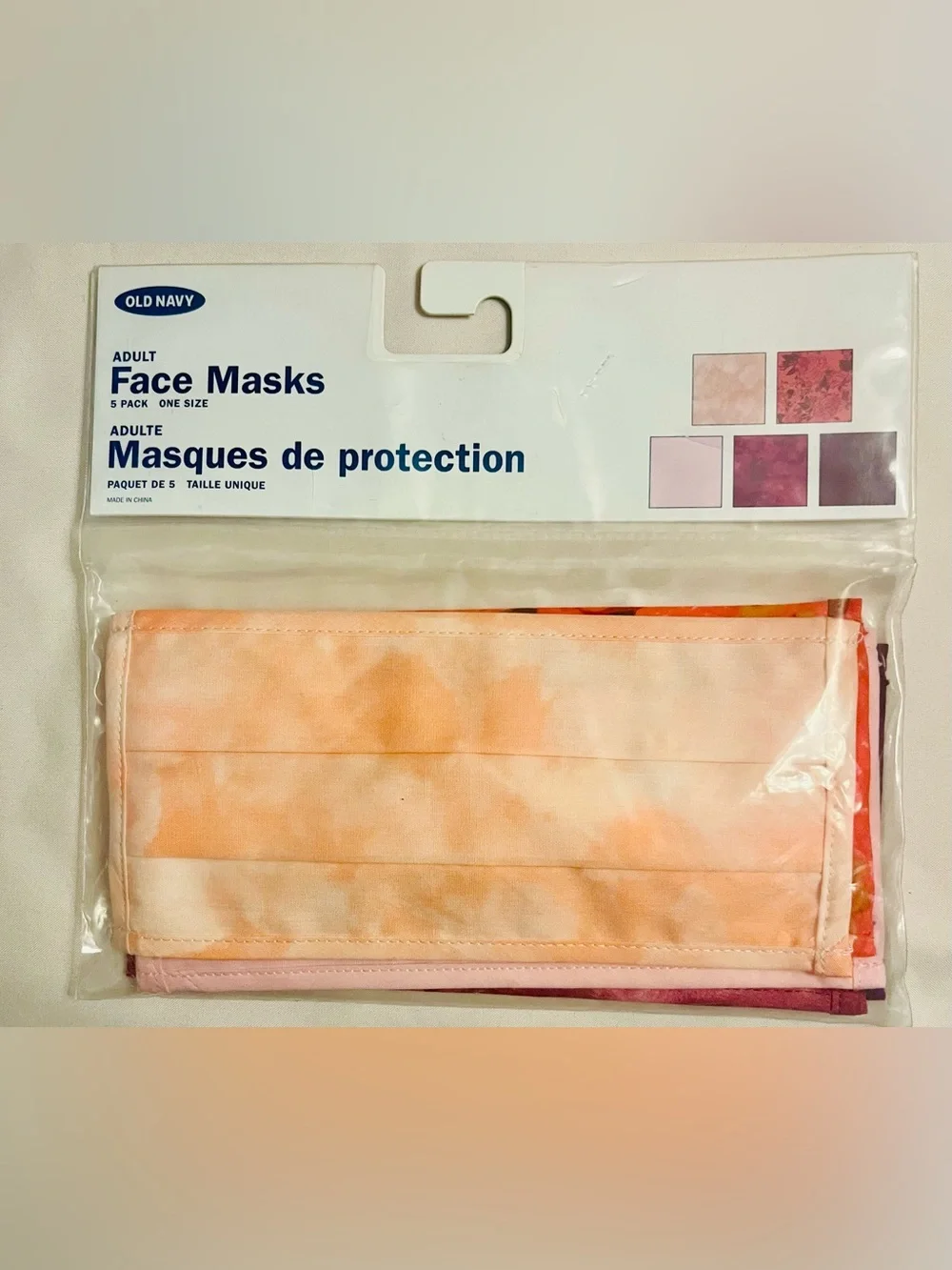 Old Navy (NEW IN ORIGINAL PACKAGING) Peach Tie-Dye Adult Face Masks.